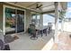Covered patio with an outdoor dining area and grill, perfect for entertaining at 15018 Marymont Ave, Huntersville, NC 28078