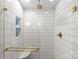 Contemporary shower with rain shower head, built-in niche, and brass hardware at 1600 Onslow Dr, Charlotte, NC 28205