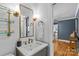 Nicely decorated bathroom with modern fixtures, stylish lighting, and elegant finishes at 1600 Onslow Dr, Charlotte, NC 28205