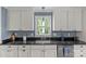 Charming kitchen with stainless steel appliances, a large sink, and ample cabinet space at 1600 Onslow Dr, Charlotte, NC 28205