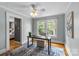 Office showcasing hardwood floors, natural light and a view of the outdoors at 1600 Onslow Dr, Charlotte, NC 28205