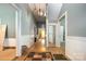 Inviting entryway with hardwood floors and original architectural details, great lighting at 1637 N College Ave, Newton, NC 28658
