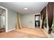 Spacious room with unfinished flooring, leading to an adjacent bathroom at 1637 N College Ave, Newton, NC 28658