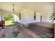 Spacious covered porch perfect for relaxing and enjoying the outdoors at 1637 N College Ave, Newton, NC 28658