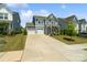 Traditional two-story home with a two-car garage, long driveway, and well-maintained lawn at 1826 Goodheart Ln, York, SC 29745