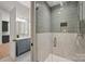 Beautifully remodeled bathroom with tiled shower and vanity at 213 Crest Ct, Weddington, NC 28104