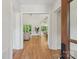 Inviting entryway with hardwood floors and an open floor plan leading into the living spaces at 213 Crest Ct, Weddington, NC 28104
