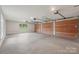 Spacious three-car garage with ample room for vehicles and storage at 213 Crest Ct, Weddington, NC 28104