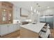 This modern kitchen features an island, stainless steel appliances, and custom cabinets at 213 Crest Ct, Weddington, NC 28104