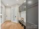 Functional mudroom with built-in storage, bench seating, and a view to the outside at 213 Crest Ct, Weddington, NC 28104