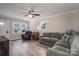 Inviting living room with natural light, laminate flooring, and ample seating, perfect for entertaining and relaxation at 2206 Whitworth Rd, Cherryville, NC 28021