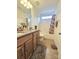 Bathroom with double sinks, granite countertops, a tub and shower with attractive tile and fixtures at 2634 Treeline Dr, Concord, NC 28027