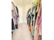 Walk-in closet features ample hanging space for clothes and accessories at 2634 Treeline Dr, Concord, NC 28027