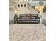 Cozy living room featuring dark hardwood floors, modern decor, and staircase at 2634 Treeline Dr, Concord, NC 28027