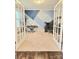 Bright office featuring french doors, modern accent wall, and comfortable workspace at 2634 Treeline Dr, Concord, NC 28027