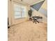 Bright office space with modern geometric accent wall, cozy carpet, and natural light at 2634 Treeline Dr, Concord, NC 28027
