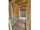 Under construction bathroom featuring wood framing and new bathtub at 2735 Primrose Ave, Charlotte, NC 28208