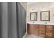 Bathroom features a double sink vanity with a shower and modern fixtures at 2765 Clover Nw Rd, Concord, NC 28027