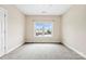 Bright bedroom with neutral carpet, paint, and natural light from a double window at 2765 Clover Nw Rd, Concord, NC 28027
