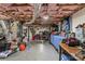 Unfinished basement with exposed insulation, ductwork, storage, and work area at 3269 Tolley St, Claremont, NC 28610