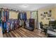 Large closet with an organization system, desk, and wood floors at 3269 Tolley St, Claremont, NC 28610