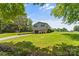 Exterior view of the home, featuring an attached garage and well-maintained lawn and landscaping at 3269 Tolley St, Claremont, NC 28610