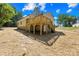 Backyard features a wooden deck with stairs and walkout basement with green space and blue sky at 332 Hollingswood Dr, Statesville, NC 28625