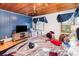 Bedroom with a wooden plank ceiling, blue and white walls, and a window at 335 Summit Se Ct, Concord, NC 28025