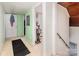 Hallway with green walls, and doors at 335 Summit Se Ct, Concord, NC 28025