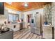 Well-lit kitchen with stainless steel appliances, modern fixtures, and ample countertop space at 335 Summit Se Ct, Concord, NC 28025