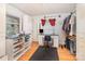 Office with a desk, chair, and a window with blinds at 335 Summit Se Ct, Concord, NC 28025