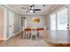Bright dining area with wood table and white chairs at 3413 Fallston Rd, Shelby, NC 28150