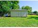 Exterior view of a light green shed in the backyard at 3413 Fallston Rd, Shelby, NC 28150