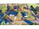 Aerial view showcasing the property's layout, trees, and road access at 456 Cornelius Rd, Mooresville, NC 28117