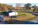 Backyard featuring a large lot, mature trees, and a storage shed at 456 Cornelius Rd, Mooresville, NC 28117