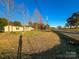 Front exterior view showing a well-maintained lawn and home's exterior at 456 Cornelius Rd, Mooresville, NC 28117