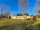 Exterior of home with well-maintained lawn and classic curb appeal at 456 Cornelius Rd, Mooresville, NC 28117