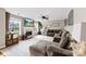 Spacious living room with fireplace, mounted TV, and comfortable seating area at 4612 Maple Crest Pl, Harrisburg, NC 28075