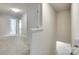 Bright hallway features neutral carpet, white trim, and leads to other rooms at 463 W Barr St, Lancaster, SC 29720