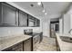 Well-lit kitchen showcasing stainless steel appliances, granite countertops, and ample cabinetry at 463 W Barr St, Lancaster, SC 29720