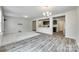 Open living space showcasing seamless flow between living and kitchen areas with modern finishes and fixtures at 463 W Barr St, Lancaster, SC 29720