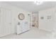 Bright bedroom features white dresser and trim, with light-filled hallway at 5310 Addington Ct, Charlotte, NC 28277