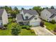 Charming two-story home featuring manicured lawn and an attached two-car garage at 5723 Lindley Crescent Dr, Indian Trail, NC 28079