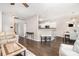 Spacious open-concept living room flows into kitchen with lots of natural light at 5723 Lindley Crescent Dr, Indian Trail, NC 28079