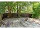 Paver patio with comfortable seating, creating a cozy outdoor retreat in a backyard at 5723 Lindley Crescent Dr, Indian Trail, NC 28079