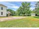 Large backyard with expansive lawn, storage shed and mature trees at 604 Ferguson Ridge Rd, Gastonia, NC 28052