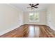 Bright and airy bedroom with large windows and hardwood floors at 604 Ferguson Ridge Rd, Gastonia, NC 28052