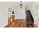 Elegant foyer showcasing hardwood floors, a view of the staircase, and open access to other rooms at 604 Ferguson Ridge Rd, Gastonia, NC 28052