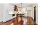 Modern kitchen with white cabinets, stainless steel appliances, wood accents, and a center island perfect for meal prep at 604 Ferguson Ridge Rd, Gastonia, NC 28052