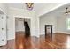 Bright living room with hardwood floors, classic fireplace, and ample natural light at 604 Ferguson Ridge Rd, Gastonia, NC 28052